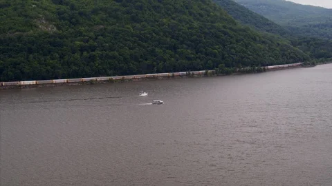 Aerial of Train Passing by the Hudson River Stock Footage 94657281