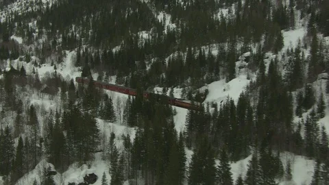 Aerial of train passing in Norway winter Stock Footage 87739862