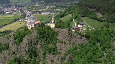 Aerial of train running through mountain forest, Buildings Stock Footage 109154104