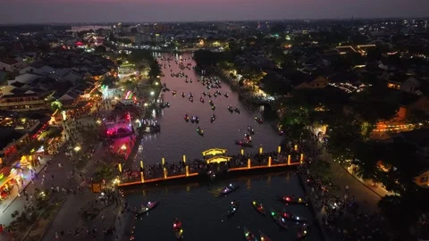 Aerial Twilight View of Ancient Riverside Town with Pink Sky Stock Footage 336382438