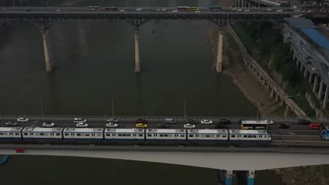 Aerial of Two Bridges Spanning a River including Traffic and Trains Stock Footage 205089750