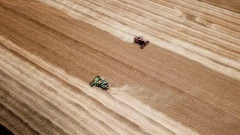 Aerial of two harvesters in the field 스톡 동영상 112913448