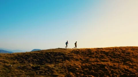 Aerial two Marathon Runners Stock Footage 120848225