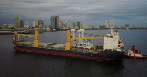 Aerial of Two Tugboats Pulling a Cargo Ship, Manila, Philippines 스톡 동영상 78688315