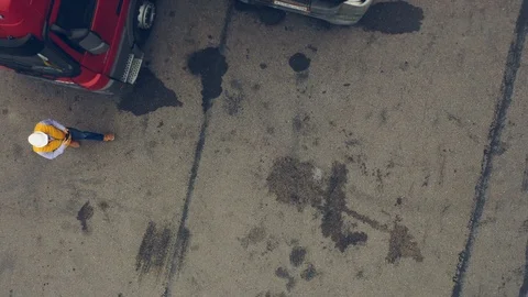 AERIAL. Two workers shake hands and talking about job. Stock Footage 111404920