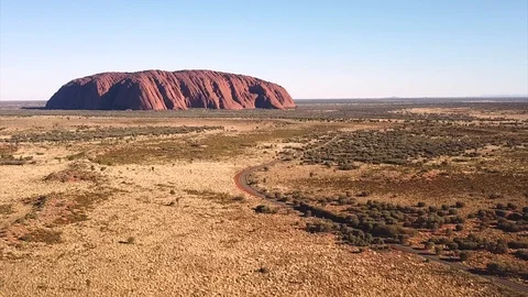 AERIAL: Uluru (Ayers Rock) From Distance, Central Australia Stock Footage 122237726