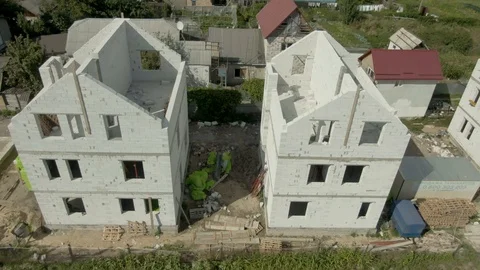 Aerial Unfinished Construction 3 object From Quadrocopter. Kiev new buildings. Video stock 115963401