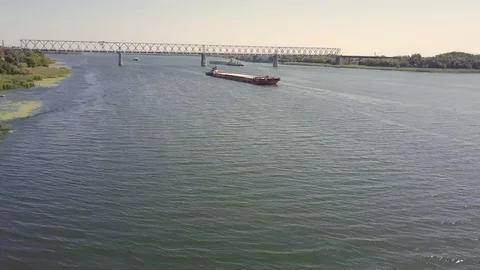 Aerial Uplift river view with barge Stockbeeldmateriaal 114836966