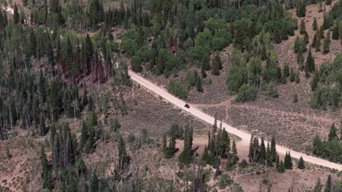 Aerial of UTV on dirt road Soapstone Pass in Wasatch National Forest Utah Vídeo Stock 341916355