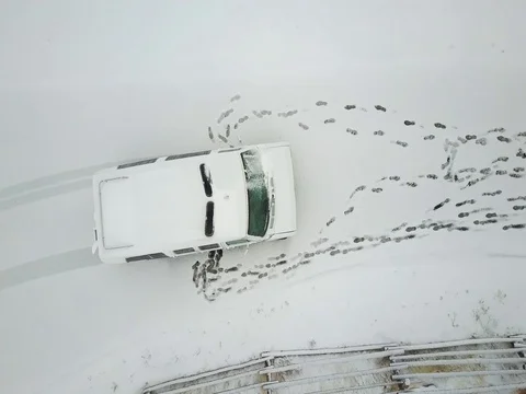 Aerial van on the winter road Stock Footage 75602504