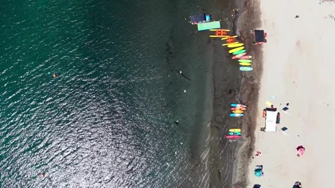 Aerial Vertical Forward Flight Top Down Shot of a Sandy Beach Shore with Co.. Stock Footage 339252249