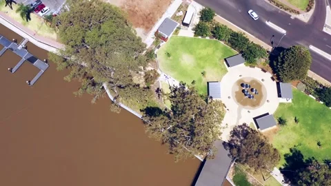 Aerial vertical panorama from Murray river surface to Renmark town streets. Stock Footage 278458743