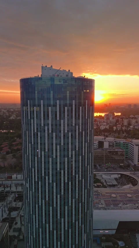 Aerial Vertical Shot Of Bucharest Sky Tower City Skyline With Golden Sunset View Stock Footage 260746370