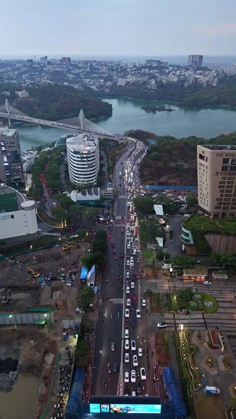 Aerial Vertical shot of traffic Jam at Durgam Cheruvu in Hyderabad, India Stock Footage 340905614