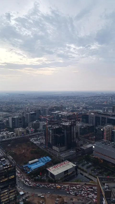 Aerial Vertical shot of traffic Jam at Durgam Cheruvu in Hyderabad, India Stock Footage 340905670