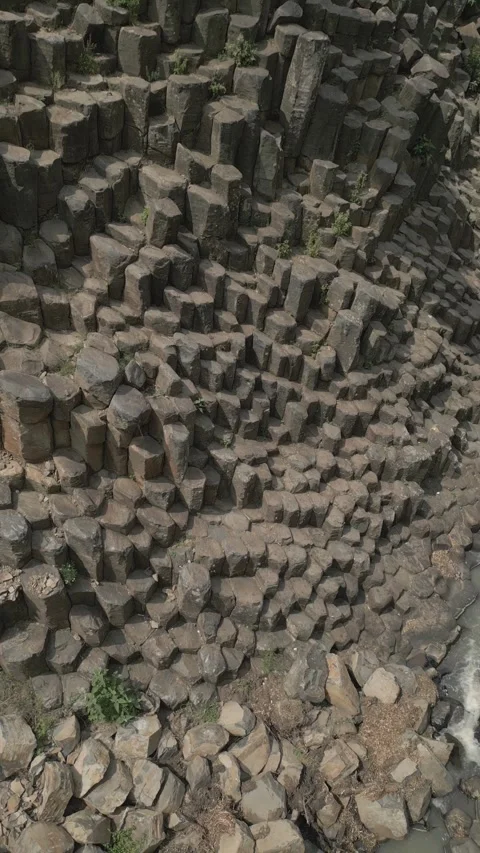 Aerial vertical video of basaltic prisms Stock Footage 240968331