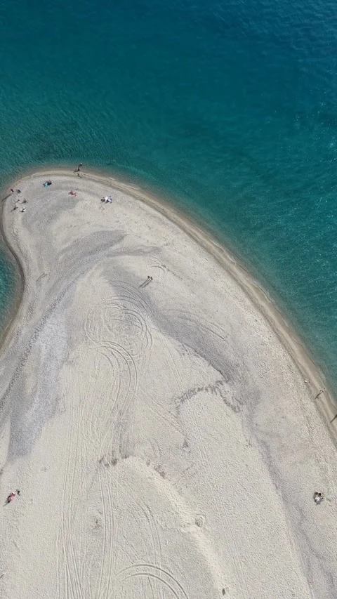 Aerial vertical video of Possidi cape beach in Halkidiki Greece with turquoise w Stock Footage 341460192