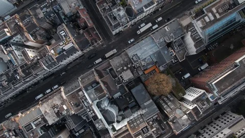 Aerial vertical view of buildings rooftops London city centre streets Video stock 125996636