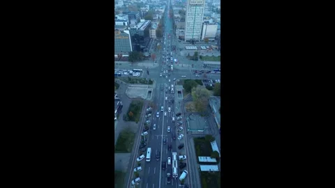Aerial vertical view of city boulevard traffic at dusk Video stock 320830342