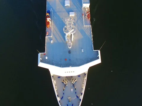Aerial, vertical view of ferryboat in motion. Helicopter landing platform Stock-Footage 79486935