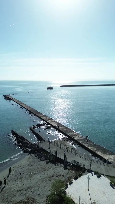 Aerial vertical view of iconic pier at port of Kalamata city, on a clear blue Video stock 332622489