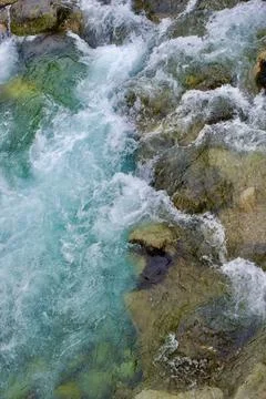 Aerial vertical view over the surface of a mountain river in Albi, French p.. Stock Photos