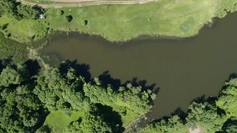 Aerial vertical view of river and rural area Stock Footage 331873995