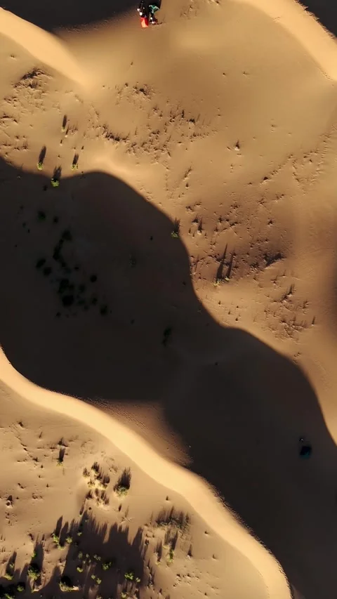 Aerial vertical view of Tengger Desert dunes with shadows Stock Footage 345367611