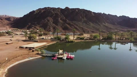 Aerial video above Timna Park National Park Deep water lake, Israel Stock Footage 279550153