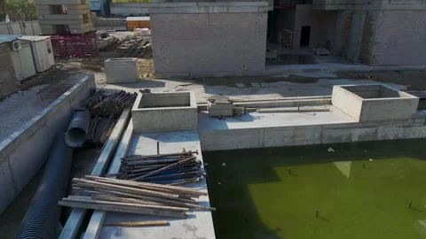 Aerial Video of Active Construction With Workers and Steel Beams Stock Footage 343595237