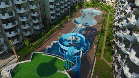 Aerial Video of an Aged Residential Complex With a Non-Functioning Swimming Pool 動画素材 301367633