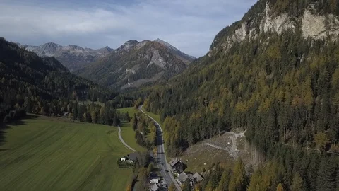 Aerial video autumn valley village and  mountains view by drone in Austrian Alps Stock Footage