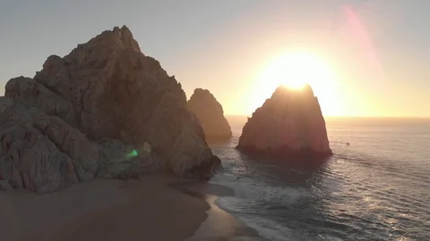 Aerial Video of Beach, Rock Cliffs, and The Arch in Cabo at Sunrise, 4K Stock Footage 125044859