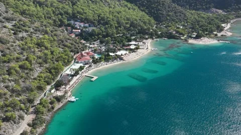 Aerial Video beach umbrellas pattern top view Oludeniz Turkey coast 動画素材 341285206