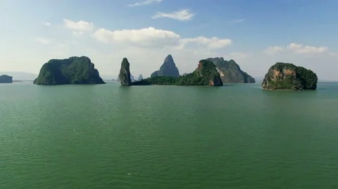 Aerial video. Camera comes close to the mountains that emerge from the sea N. Stock Footage 63116008