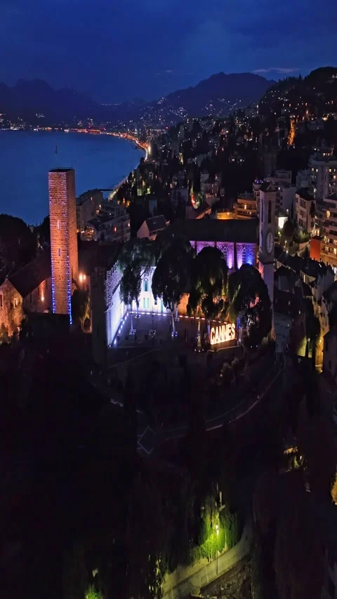 Aerial video in Cannes with a view of the beach and luxurious buildings at Stock Footage 320884948