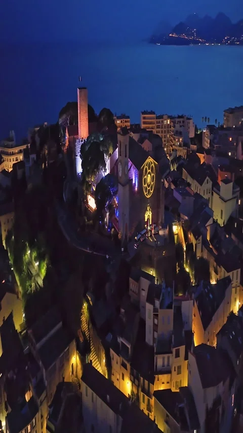 Aerial video in Cannes with a view of the beach and luxurious buildings at Stock Footage 320903657