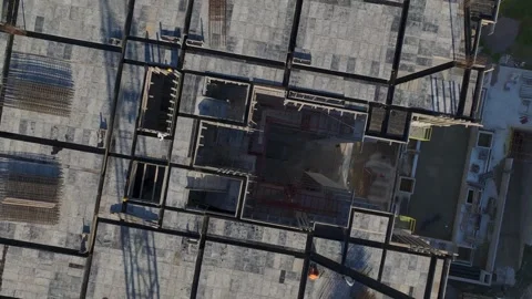 Aerial Video of City Tower Construction Near Other Blocks Stock Footage 343346237