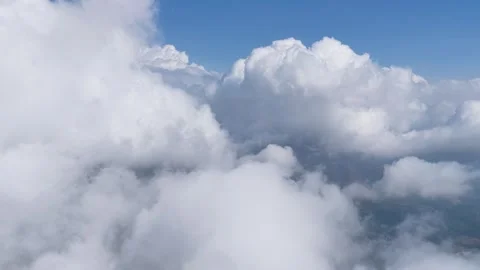 Aerial Video Cloudscape with Blue Sky and Soft White Clouds from Above Stock Footage 341006449