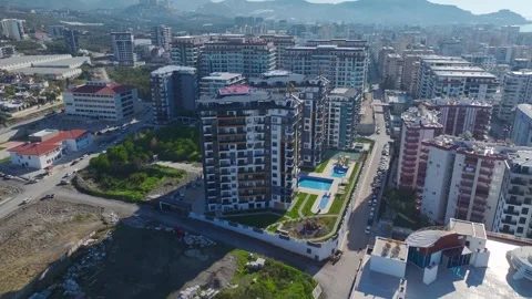 Aerial Video: Construction Activity With Concrete Pouring, Metal Work, and Stock Footage 342484097