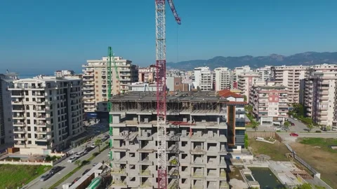 Aerial Video: Construction Progress on a Multi-Story Building With Workers and Stock Footage 342518801