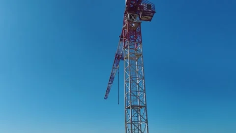 Aerial Video: Construction Progress With Workers Using Cranes and Handling Metal Stock Footage 342502247