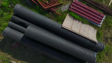Aerial Video: Construction Workers Completing Concrete Floors on a High-Rise Stock Footage 342520004