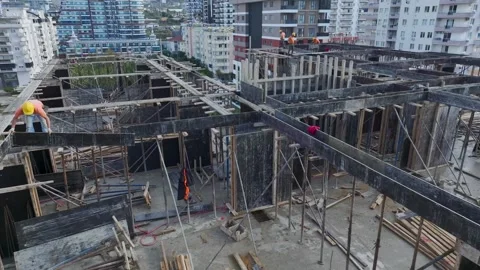 Aerial Video: Construction Workers Preparing Floors for Concrete Pouring and Stock Footage 300934722