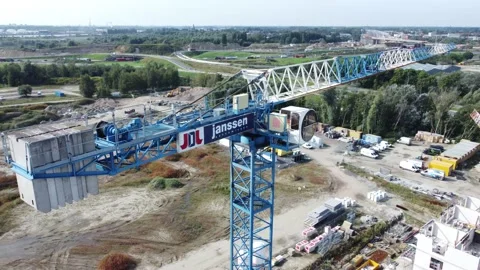 Aerial video of crane at same level and height as cabin Stockbeeldmateriaal 160911585