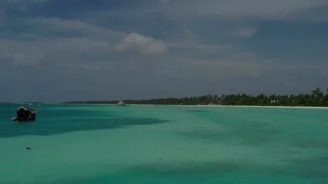 Aerial video of a drone flying over a picturesque beach Stock Footage 243077396