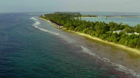 Aerial video of a drone flying over a picturesque beach Stock Footage 243081571