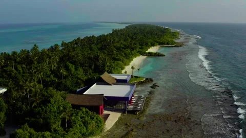 Aerial video of a drone flying over a picturesque beach Видео 243081860