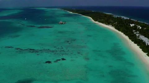 Aerial video of a drone flying over a picturesque beach Stock Footage 243085106