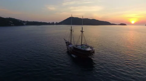 Aerial Video. The drone revolves around a sailboat at sea. N. Stock Footage 63108412